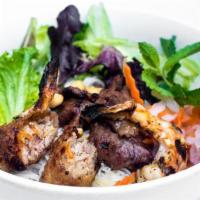 Omai Salad · Vermicelli salad with shrimp, BBQ pork, spring rolls, peanuts.