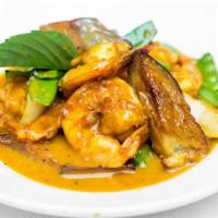 Cari Tom · Sautéed jumbo shrimp with vegetables, light coconut curry sauce.