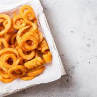Curly Fries · Curled potato slices fried to perfection.