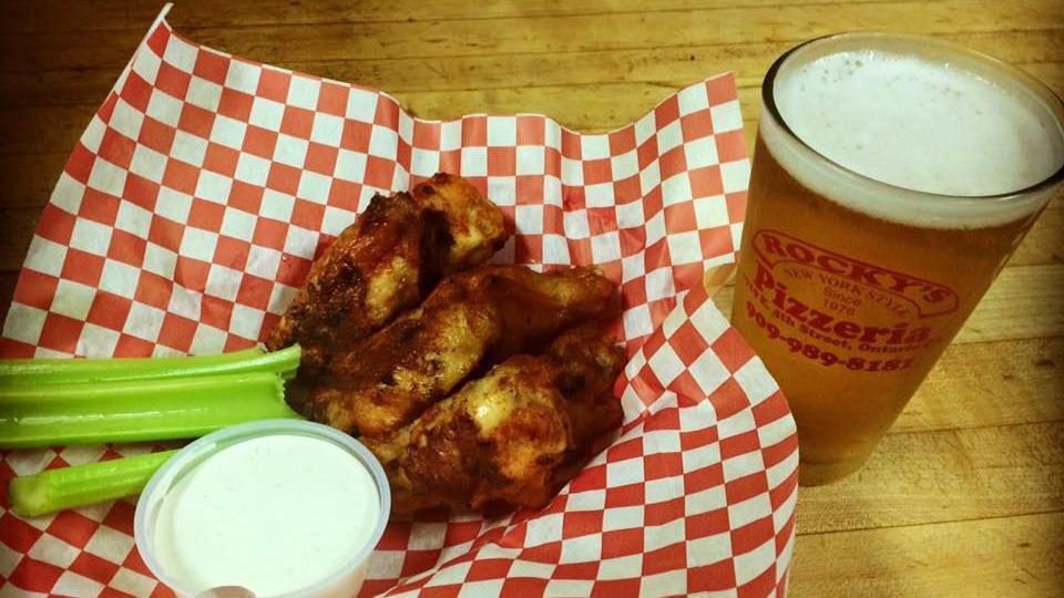 Buffalo Chicken Wings · Served with celery and choice of dressing and sauce.
