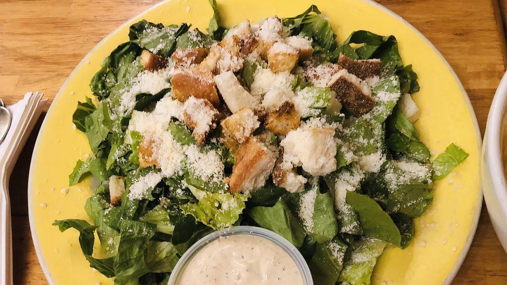 Caesar Salad · Romaine lettuce, croutons, Parmesan cheese, Caesar dressing.