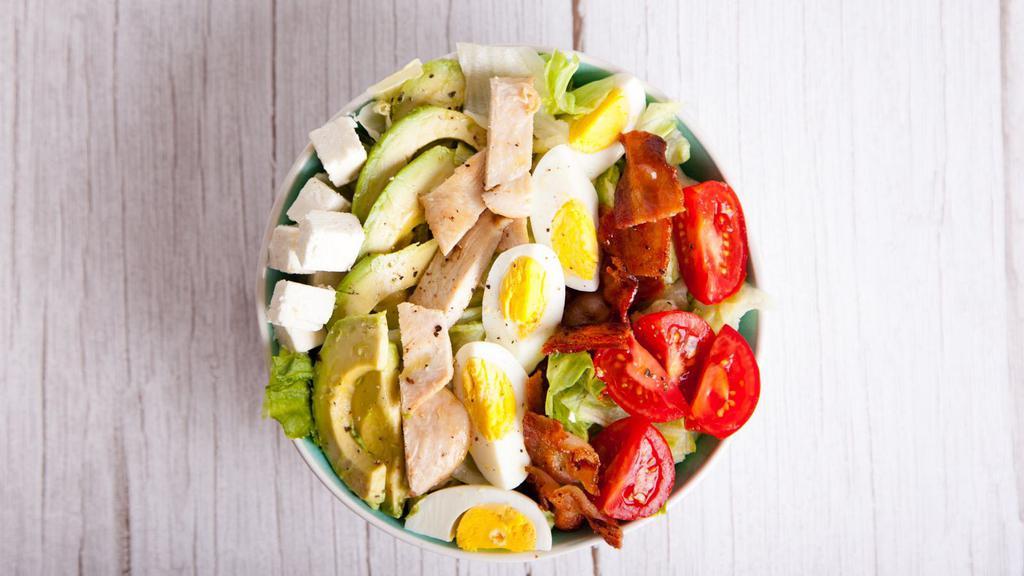 Cobb Salad · Satisfying salad full of mixed greens, corn, tasteful tomatoes, hard boiled egg, oven roasted turkey and fresh avocado.