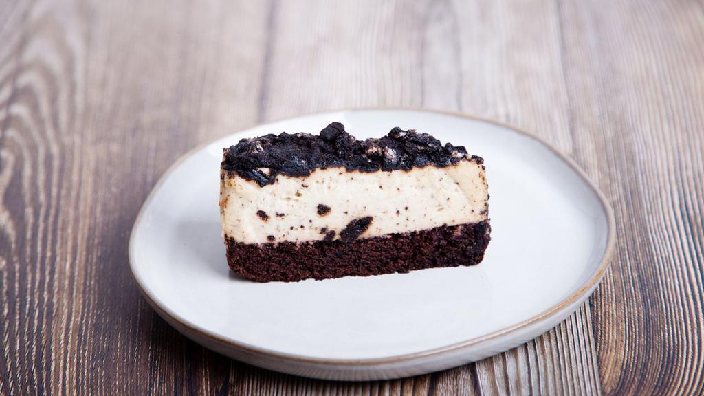 Oreo Cake · Delicious, moist chocolate cake layered with buttercream frosting, and topped with Oreo cookie crumbs.