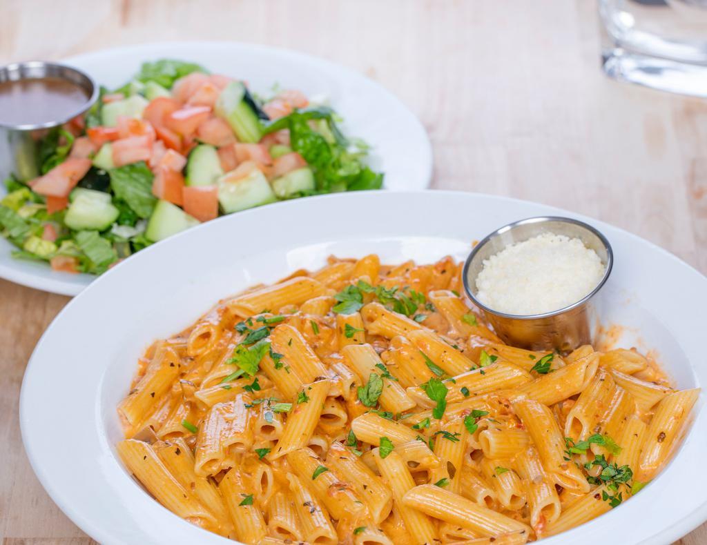 Penne Ala Vodka With Salad · Sautéed with sun-dried tomatoes in a vodka cream sauce. Served with side salad.