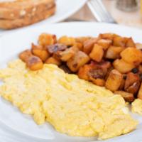 Two Eggs Any Style · Served with potatoes and toast