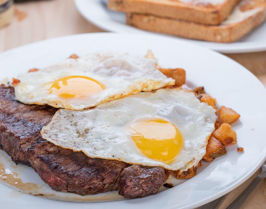 Strip Or Sirloin Steak And Two Eggs · 