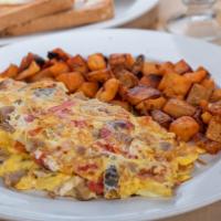 Italian Omelette · Sausage, red peppers, mushrooms, tomatoes and mozzarella
