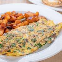 House Omelette · Spinach, mushrooms, and Swiss cheese. Served with potatoes and toast.