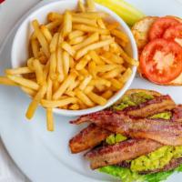 Guacamole Bacon Burger · 1/2 lb. Beef burger topped with guacamole, diced tomato, onion, and bacon bits. Served with ...