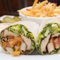 New York Wrap · Grilled chicken, crispy bacon, lettuce, and tomato. Served with homemade coleslaw and a pick...