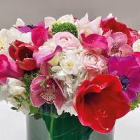 Love Medley · A sweet blend of white,pink, red, and fuchsia. Cymbidium orchids, calla lilies, amaryllis, r...