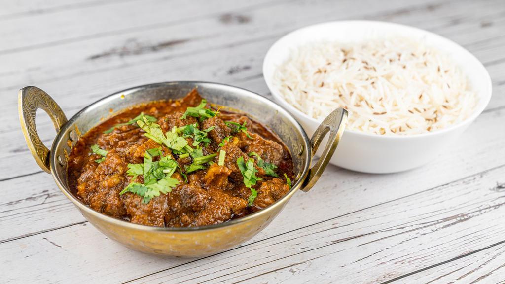 Lamb/Goat Curry · Tender cubes of Lamb cooked in a mildly spiced curry sauce