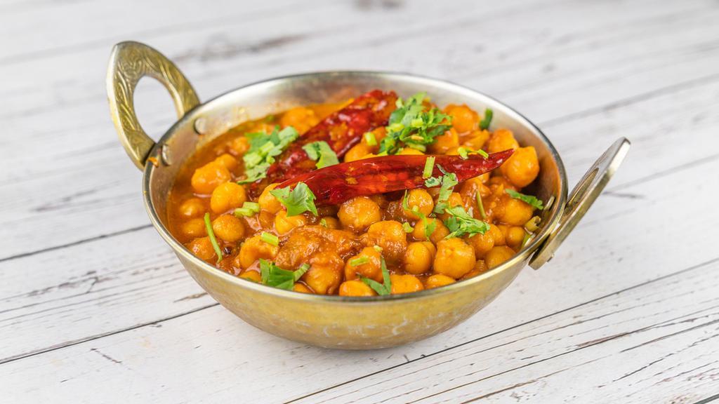 Channa Saag · Chickpeas and Spinach cooked with a special blend of Herbs and spices