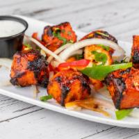 Chicken Tikka · Boneless pieces of Chicken marinated aromatic spices and BBQ in a clay oven