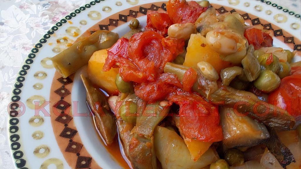 Vegetable Dish · Green beans, eggplant, zucchini, potatoes and bell peppers baked with tomatoes and carrots in an earthenware casserole dish.