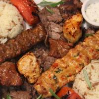 Grillera Combination Plate · Comprised of lamb shish, chicken shish, skewered ground lamb, skewered ground chicken, and d...