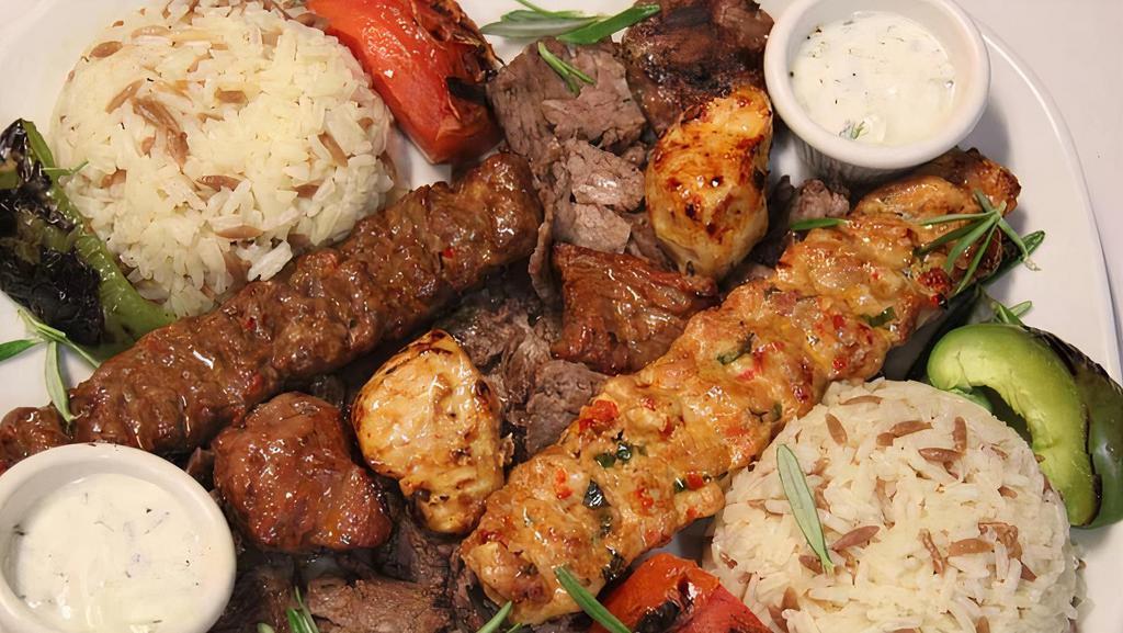 Grillera Combination Plate · Comprised of lamb shish, chicken shish, skewered ground lamb, skewered ground chicken, and doner kebab.