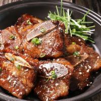 A33 Grilled Marinated Short Rib.  · [LA Galbi] It comes with salad, soup, rice.