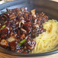 Black Bean Noodle · Jajangmyeon or jjajangmyeon is a Korean noodle dish topped with a thick sauce made of chunki...