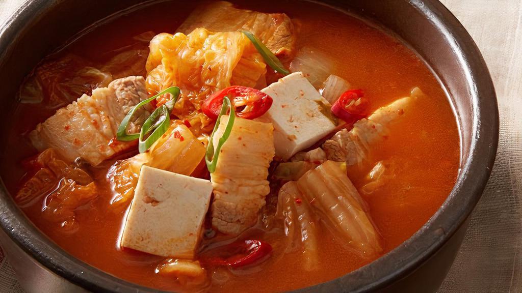 Kimchi-Pork Stew · Kimchi & pork belly stew with rice.