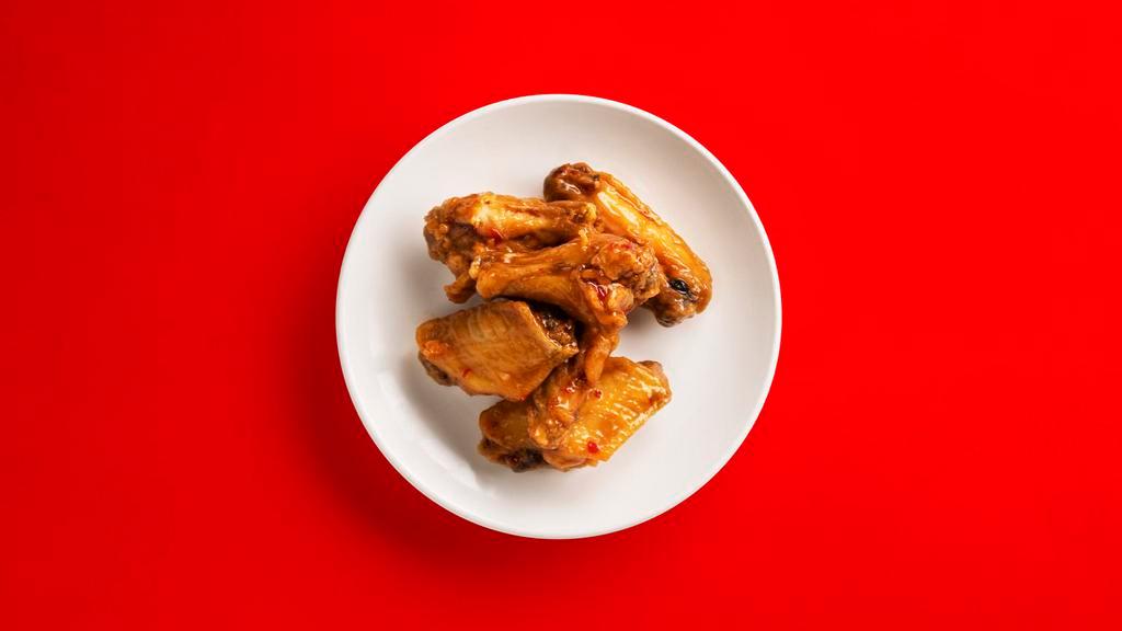 Spicy Thai Wings · Crispy and fried spicy chicken wings.