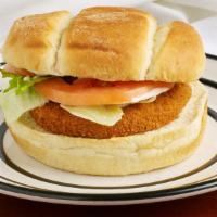 Chicken Sandwich Deluxe · A boneless fried chicken served on a toasted bun with pickles, lettuce, tomato with french f...