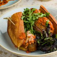 Meatball Sandwich · beef, mozzarella, arugula, marinara sauce on a french baguette with salad
