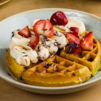 Lemon Poppyseed Waffle · With blueberry compote, berries, chantilly cream, toasted buckwheat, and almonds.