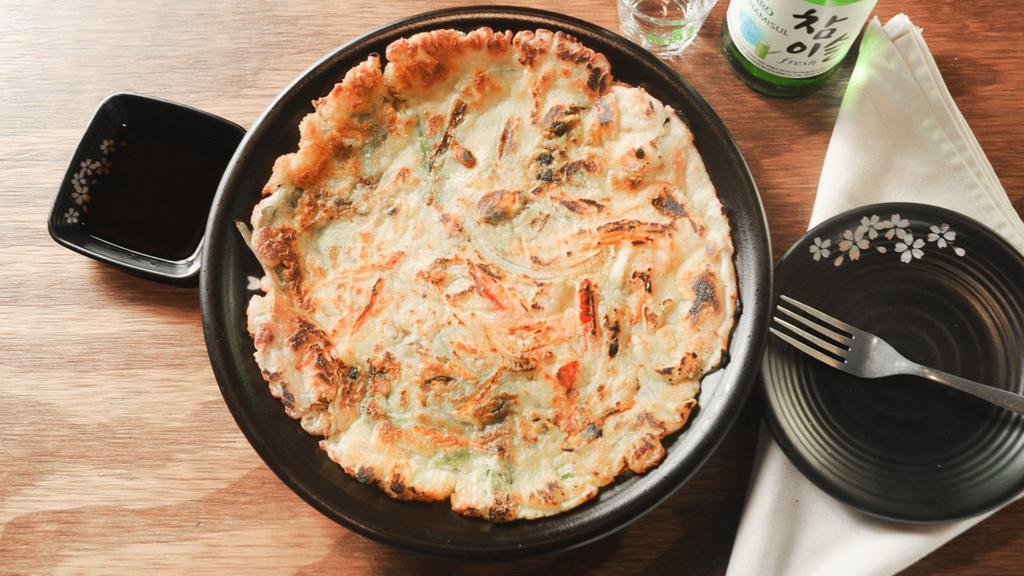 Scallion Pancake With Seafood · Crispy and chewy pancake with scallion, mixed seafood & vegetable
