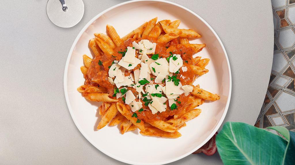 Penne Vodka Pensil · Gluten- free penne pasta served with a smooth creamy tomato sauce.