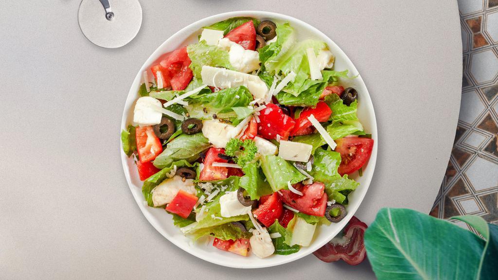 House Hour Salad · Romaine lettuce, mixed baby greens, vine tomatoes, bermuda onions, cucumbers, black olives, green and red peppers with Italian Dressing.