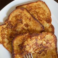 3 Buttery Slices Of French Toast · 3 Perfectly cooked French Toast slices.