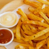 Seasoned Fries · Golden-crispy fries with a sprinkle house special spices.