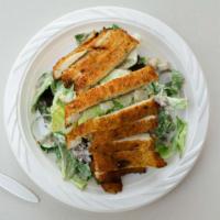Chicken Caesar Salad · Grilled chicken, Parmesan cheese, croutons and Caesar dressing.