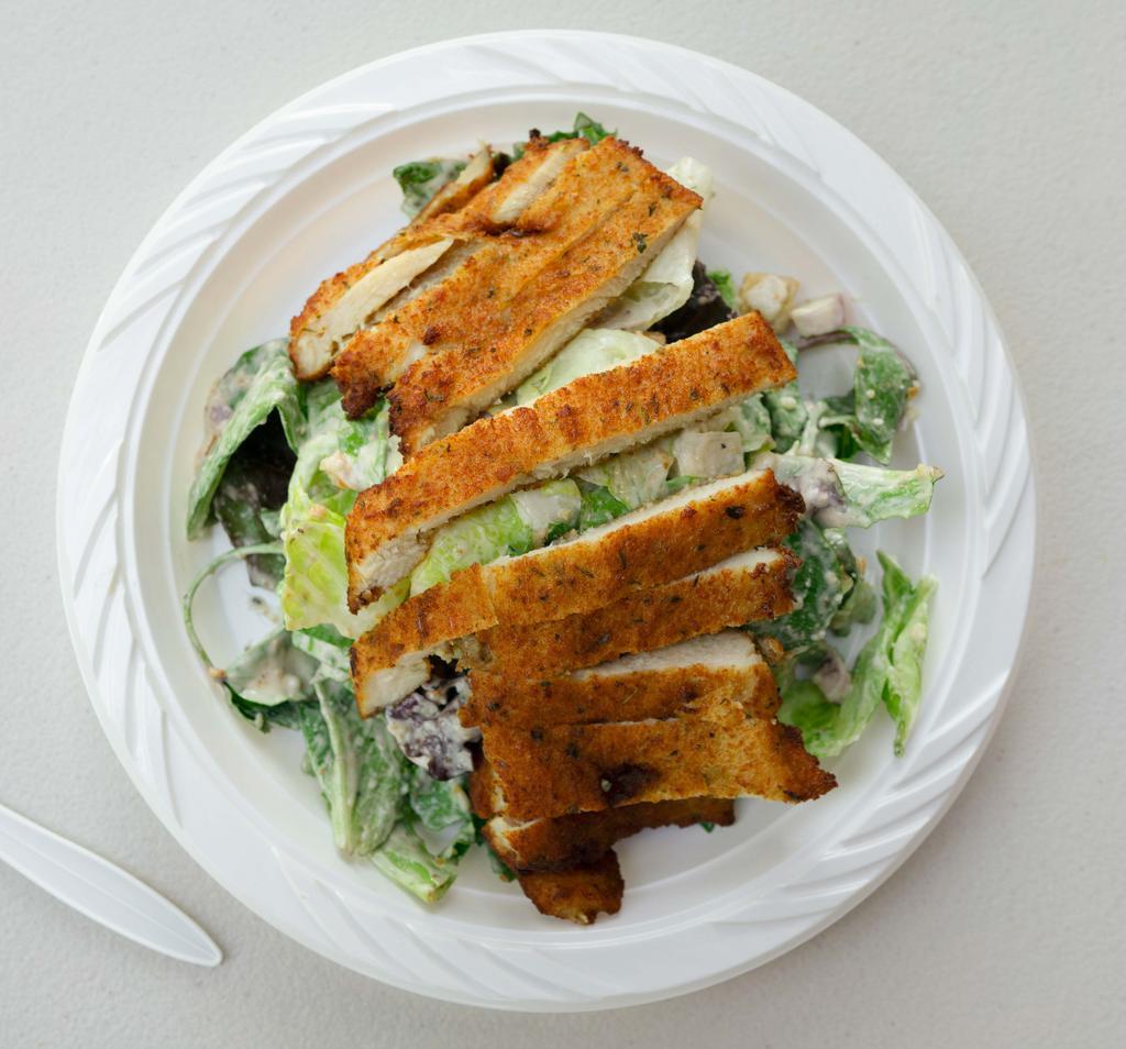 Chicken Caesar Salad · Grilled chicken, Parmesan cheese, croutons and Caesar dressing.