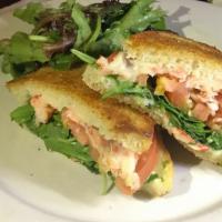 Lobster Grilled Cheese · Sandwich with mascarpone, aged provolone, scallions, roma tomato and baby arugula.