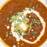 Dal Makhani · Lentils and kidney beans cooked with ground herbs and spices. Served with rice.