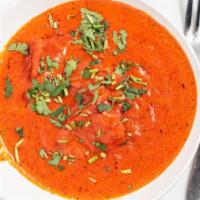Chicken Tikka Masala · Top menu item. Chicken marinated with tandoori spices charcoal grilled and simmered in enric...