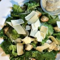 Caesar Salad · Romaine lettuce, seasoned croutons, parmesan cheese and caesar dressing.