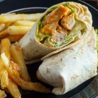 Halal Chik'N Wrap With Fries · Homemade pita bread filled with grilled chicken. Garnished with lettuce, tomatoes, and savor...