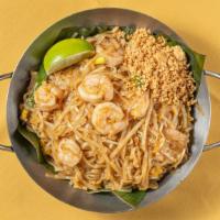 Pad Thai · Hot. Stir-fried Thai noodles with baby shrimp, egg, bean sprouts, dry tofu and topped with g...