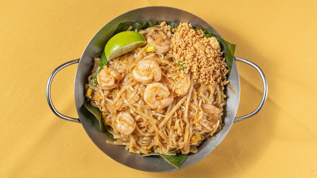 Pad Thai · Hot. Stir-fried Thai noodles with baby shrimp, egg, bean sprouts, dry tofu and topped with ground peanuts.