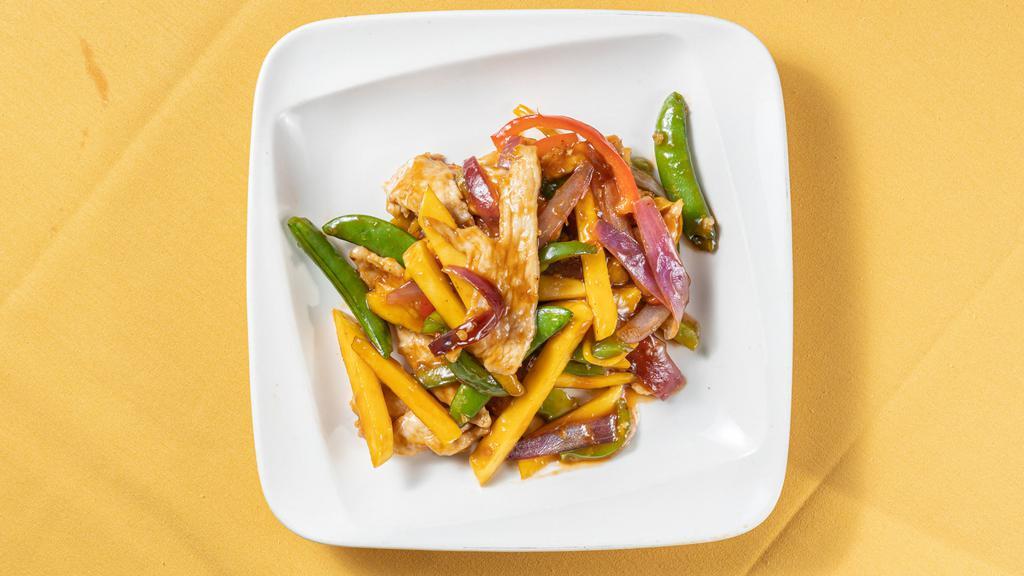 Mango Chicken · Mango, red onions, pepper, sweet pea pod, chicken, sweet and sour.