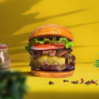 Orlando Shroom Vegan Burger · Seasoned vegan burger patty topped with mushrooms, melted vegan cheese, lettuce, tomato, oni...