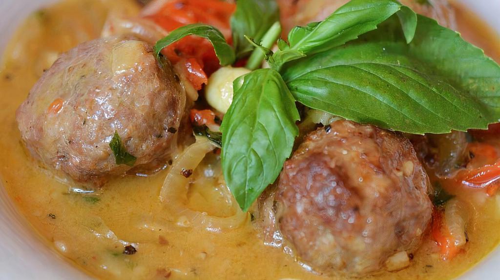 Fried Meatballs · Meatballs slow fried with onions and cherry peppers.