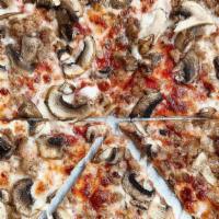 Prosciutto E Funghi Pizza · Tomato sauce, fresh mozzarella, mushrooms, and prosciutto.