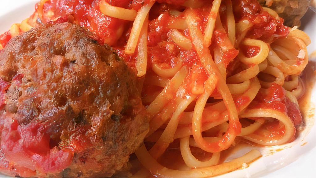Spaghetti & Meatballs · Freshly made meatballs in homemade tomato sauce served over spaghetti.