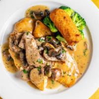 Pollo Scarpariello · Breasts of chicken with sweet sausage, garlic, rosemary, fresh thyme and mushrooms cooked in...