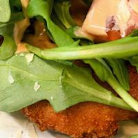 Pollo Milanese · Lightly breaded and pan-fried served with arugula and fresh tomatoes. Served with a vegetabl...