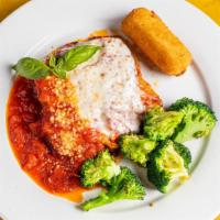 Eggplant Parmigiana · Eggplant breaded and baked with tomato sauce, mozzarella and grated parmigiano served with a...